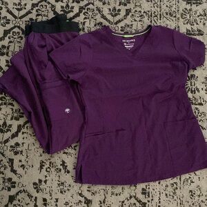 HH Works by Healing Hands. Purple scrubs. Top size Medium bottoms Medium Petite.
